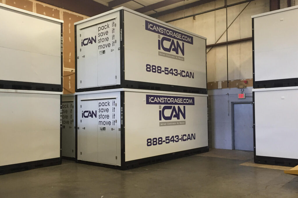 Stacked storage containers in a warehouse.